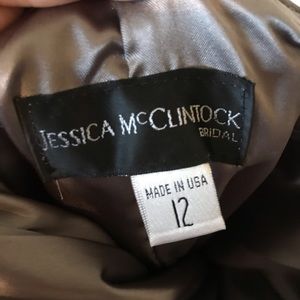 Long, strapless,grey dress with shawl.